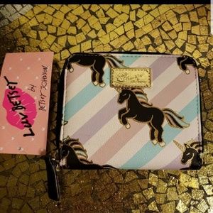 Luv Betsey black Unicorn with pastel stripes
